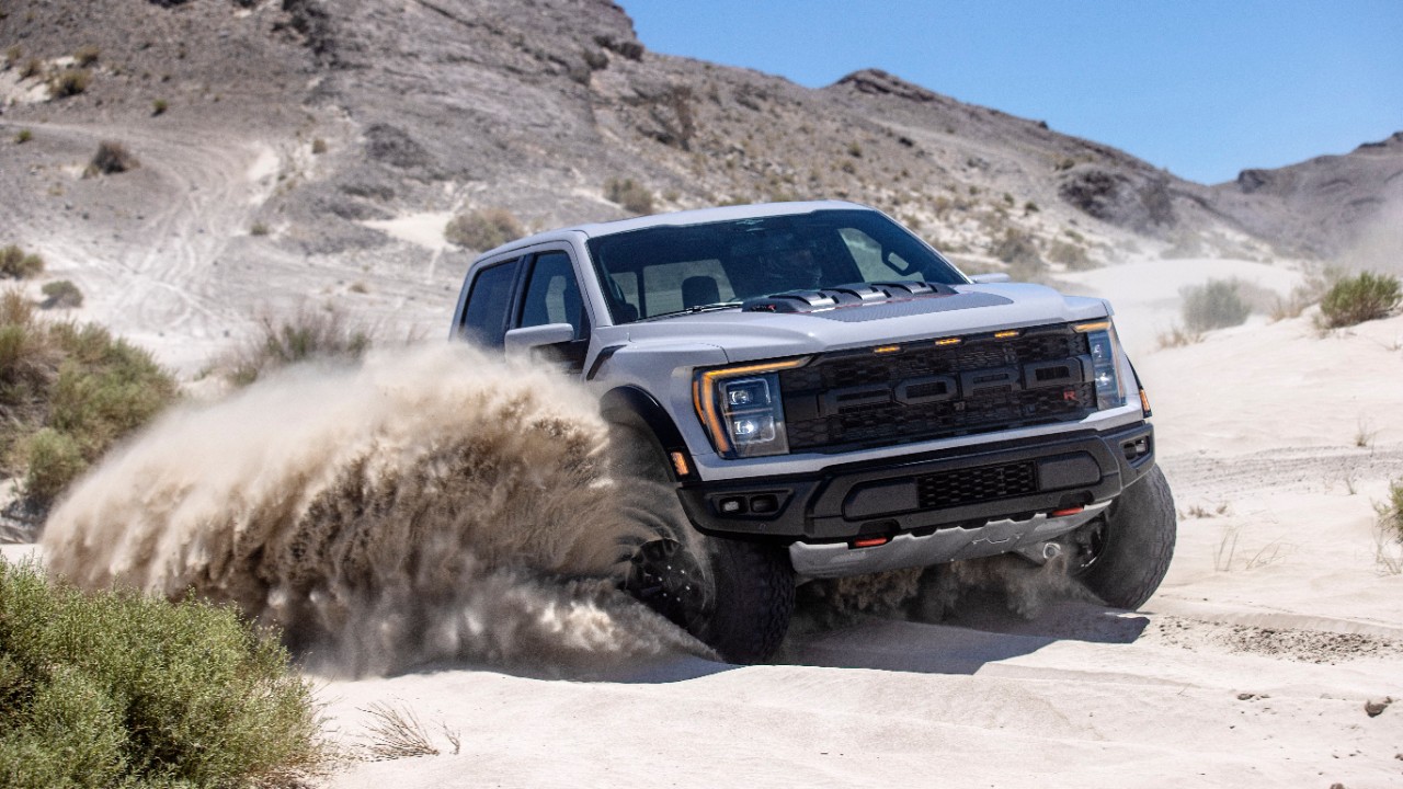 2023 Ford F-150 Raptor R kicking up dust in the desert